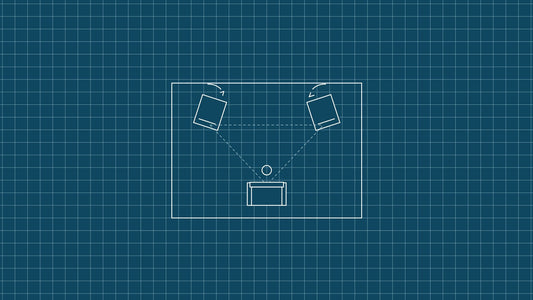Blueprint-style line drawing on a teal grid: a room plan with two speakers angled towards a listening seat.